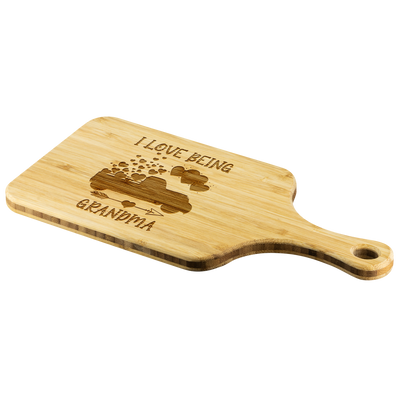 I love being grandma cutting board teelaunch